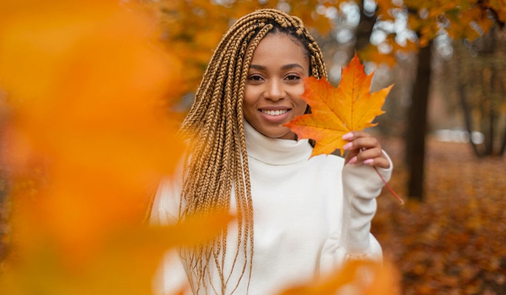 woman-smiling-outdoors-in-fall-weather